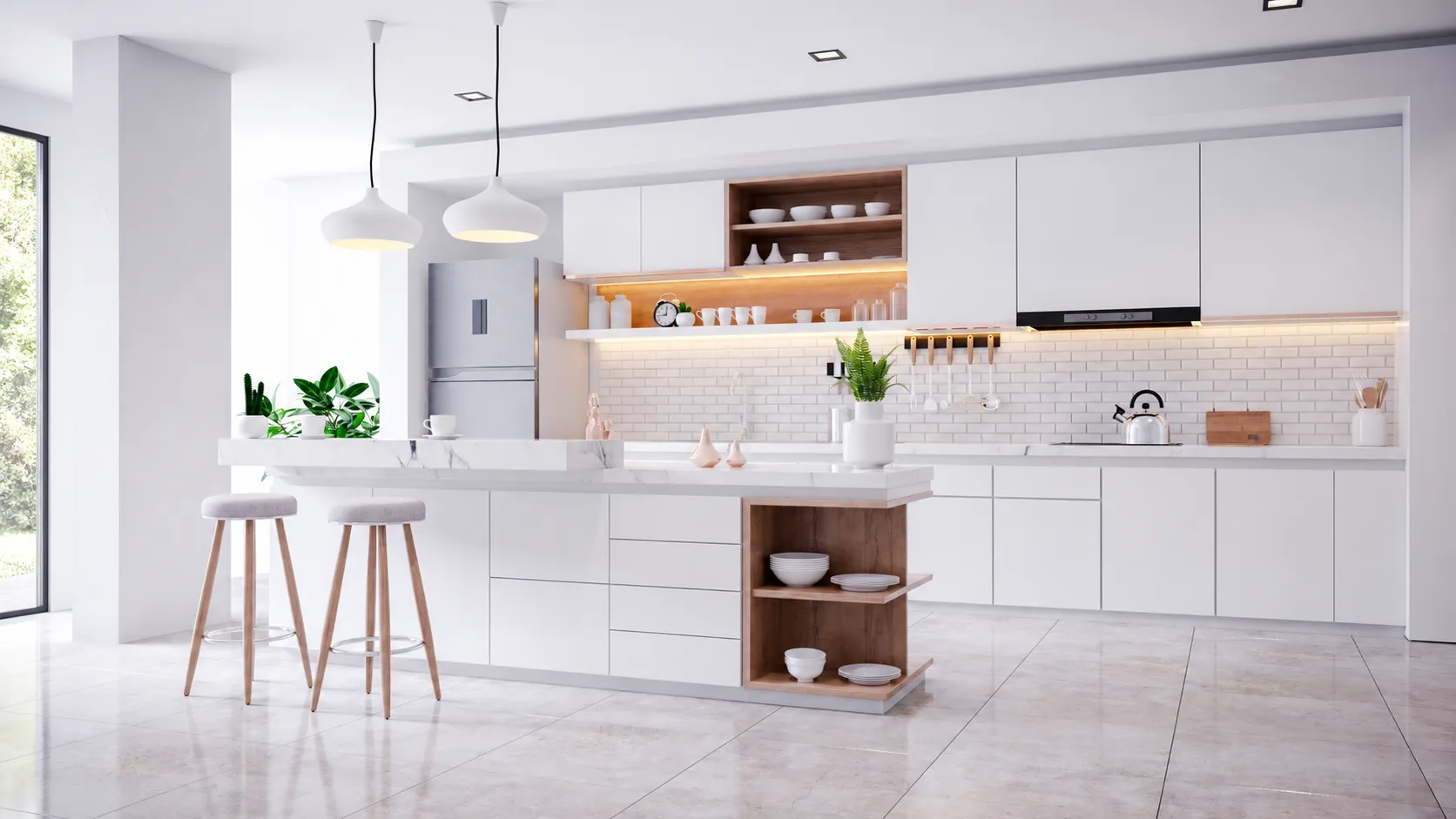 Bright open kitchen with white cabinetry and polished tile flooring